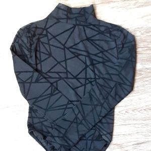 Women's black long-sleeved shirt with transparent fabric